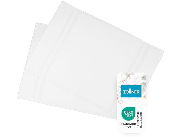 ZOLLNER two-pack of white cotton bath mats with a border